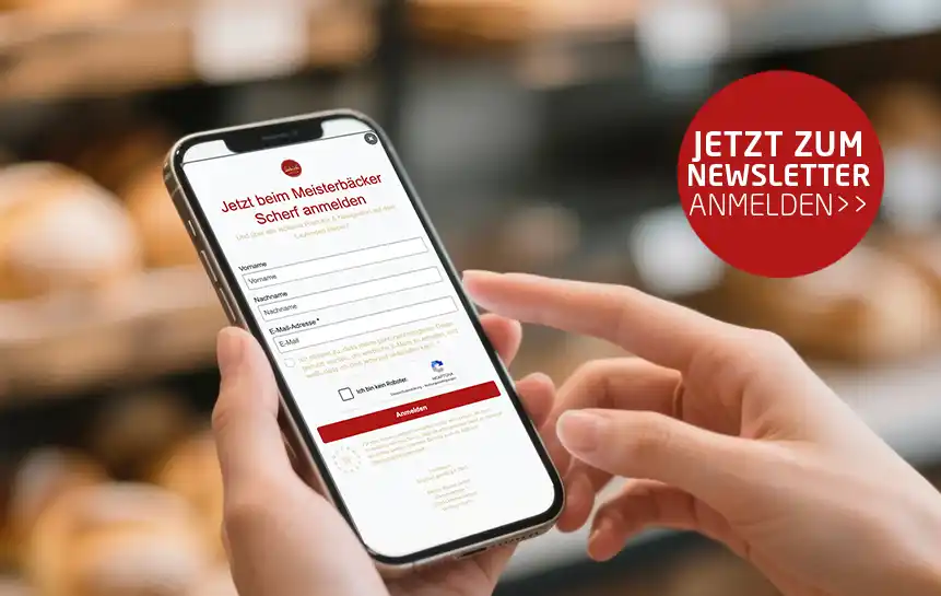 Das Bild zeigt eine Frau beim Bäcker die sich beim Newsletter von Scherf anmeldet